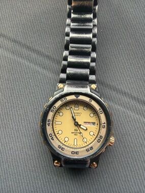 Seiko Yellow Dial Black and Gold Accent Sports Watch
